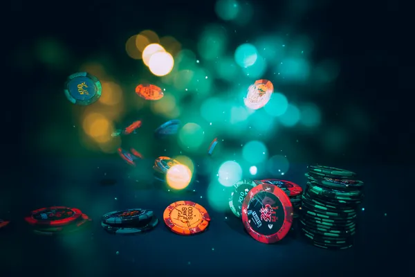 QWE123 Live Casino — Join thrilling real-dealer tables A professional dealer in a tuxedo greeting players at the roulette table, symbolizing the authentic live casino feel at QWE123.